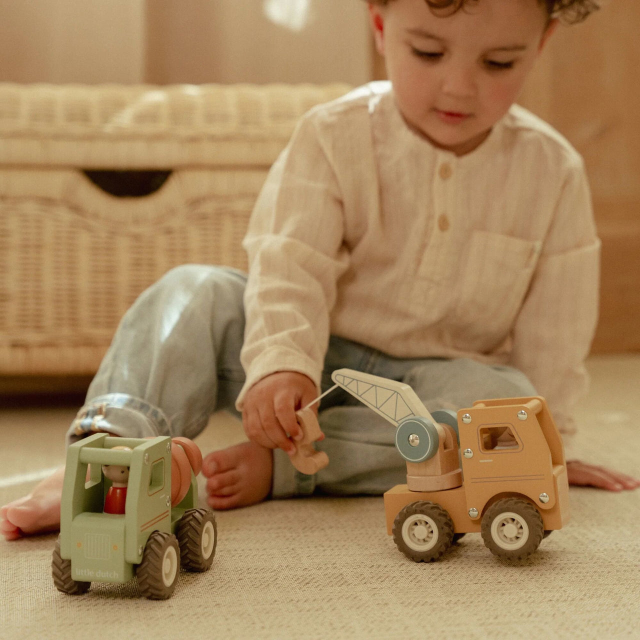 Camion con gru con personaggio