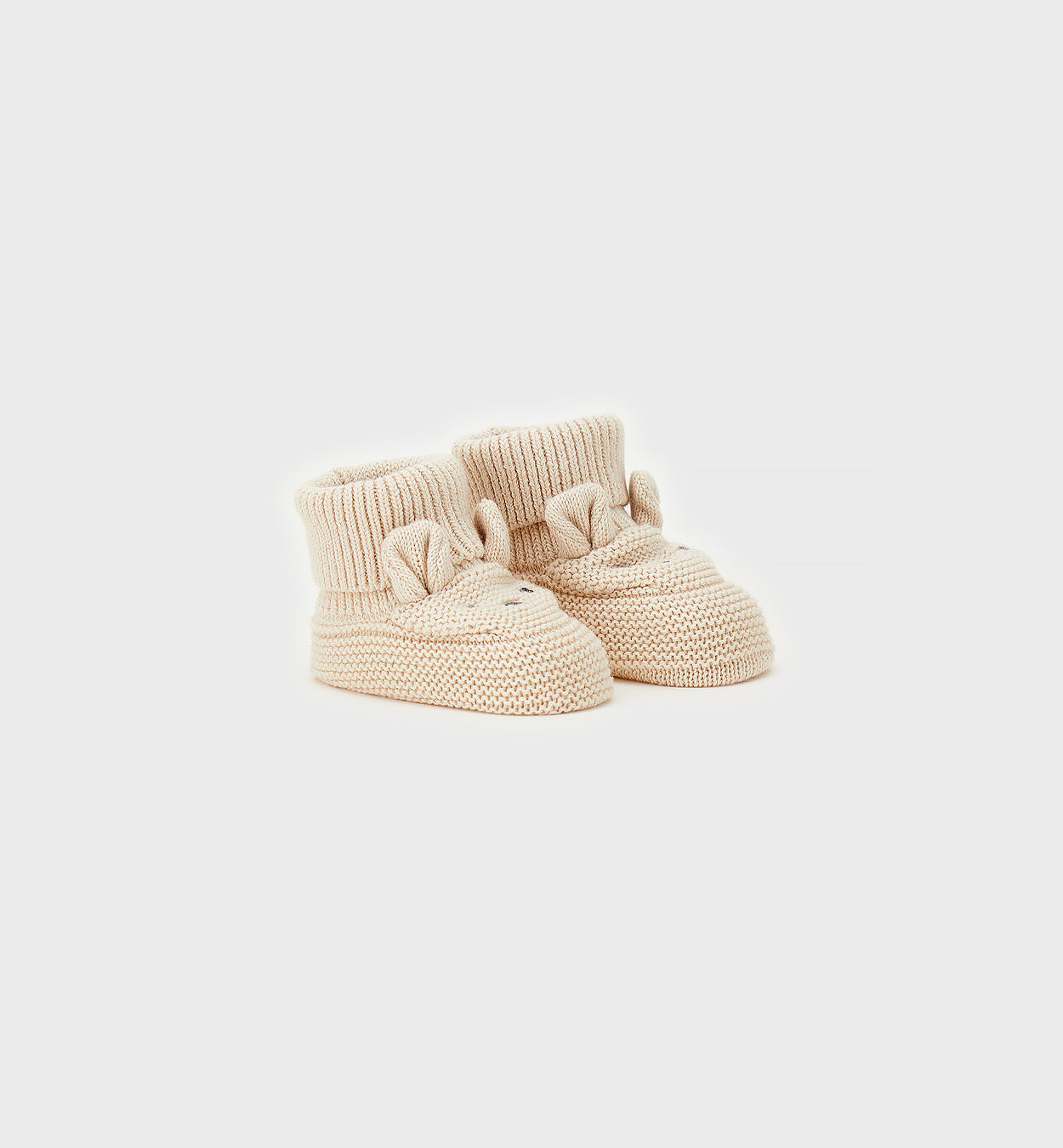 COPRIPIEDE IN MAGLIA BEIGE
